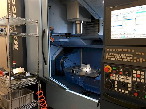 cnc machine center 5 axis|5 axis machining center manufacturers.